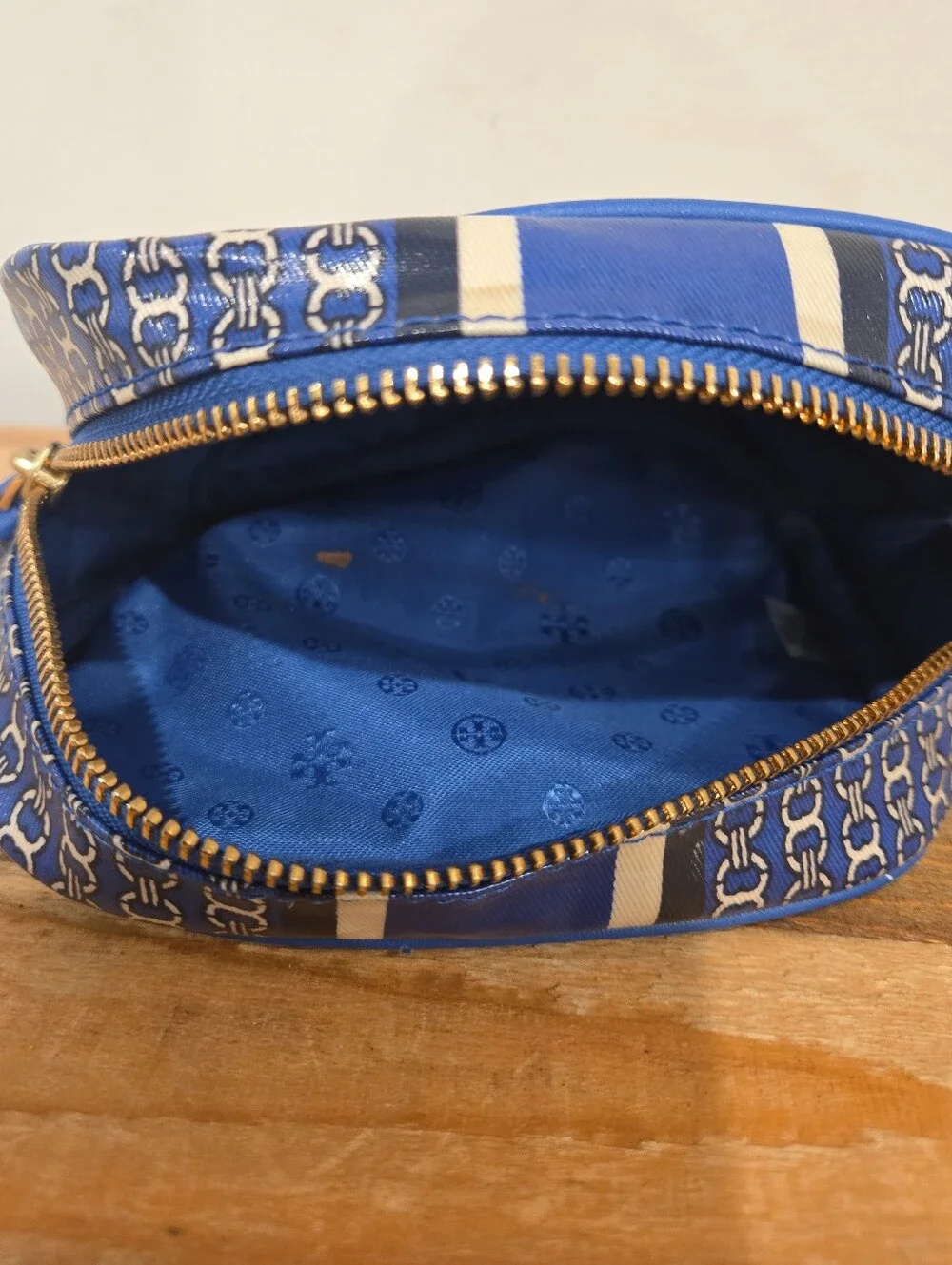 Tory Burch Gemini Link Stripe Makeup Bag With Vertical Striped Design.